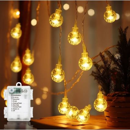 Aigostar - LED vonkajší svetelný reťazec 100xLED/3xAA/8 režimov 10,3 m IP44 teplá biela