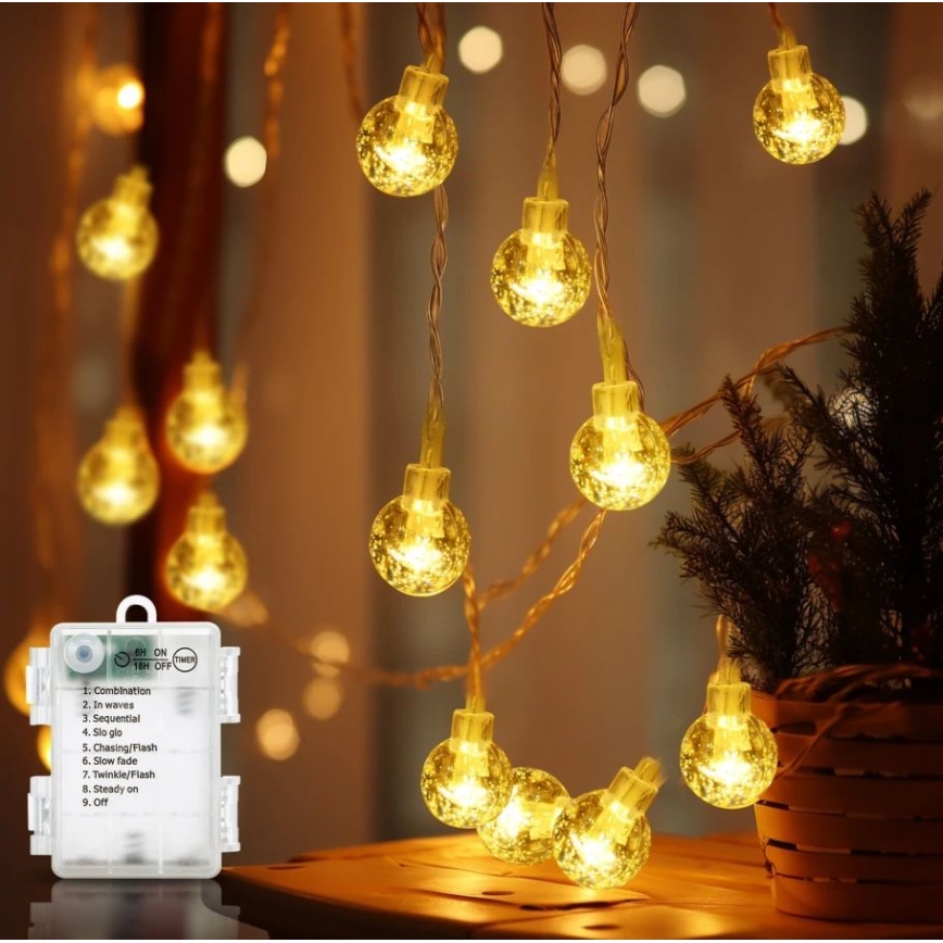 Aigostar - LED vonkajší svetelný reťazec 100xLED/3xAA/8 režimov 10,3 m IP44 teplá biela