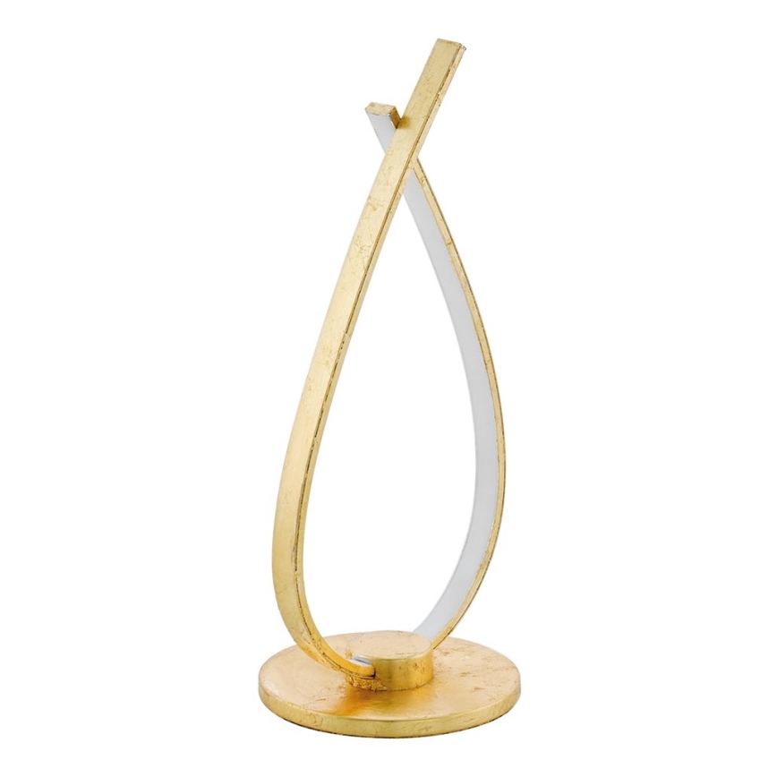 Zlatá stolová lampa v tvare kvapky stojí na kruhovom podstavci. Dve zlaté krivky vytvárajú jej tvar, vnútro je biele. Lampa je osvetlená.