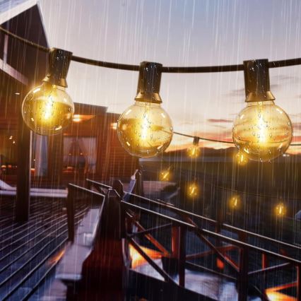 LED stmievateľný vonkajší dekoratívny svetelný reťazec 25xE12/1W/24/230V 17,5 m IP65 čierny + diaľkové ovládanie