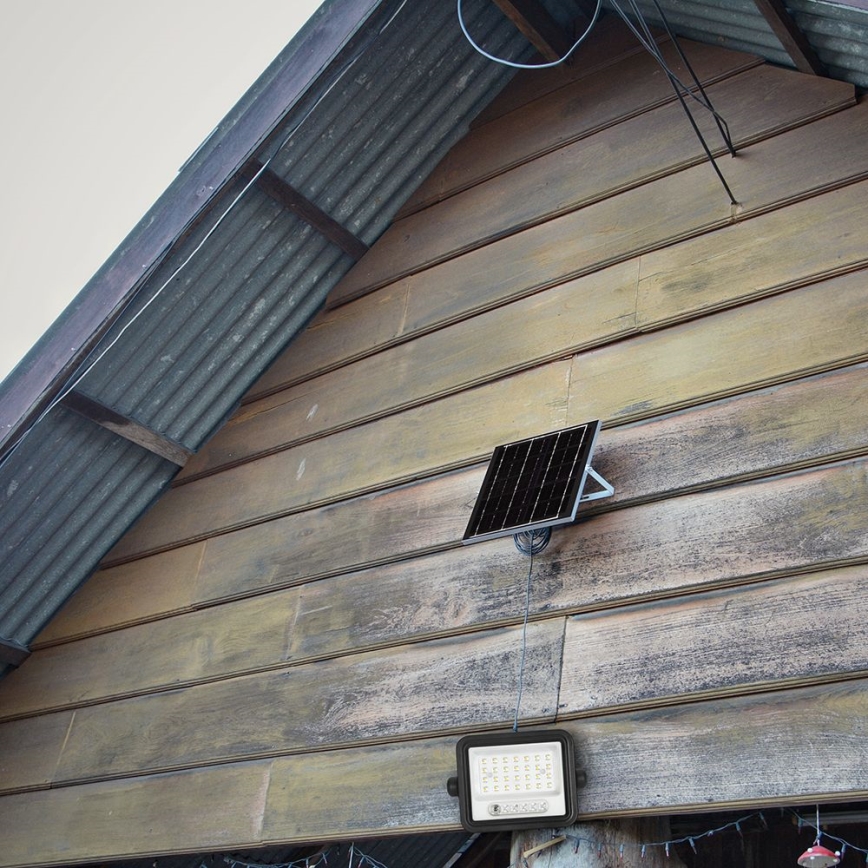 Stmievateľný solárny LED reflektor LED/50W/3,2V 2000-8000K IP65 3800 mAh čierny + diaľkové ovládanie