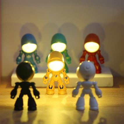 LED stolná lampa LED/0,06W/3xLR41 robot žltá