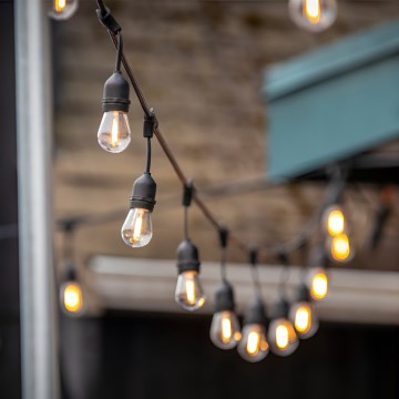 LED Vonkajšia dekoračná reťaz BAJA ST64 20xE27/1W/230V 20,9m IP44 teplá biela