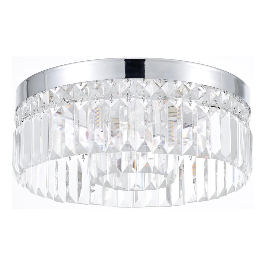 Stropné svietidlo s chrómovým rámom a dvoma radmi visiacich krištáľových prvkov, ktoré osvetľujú priestor.
