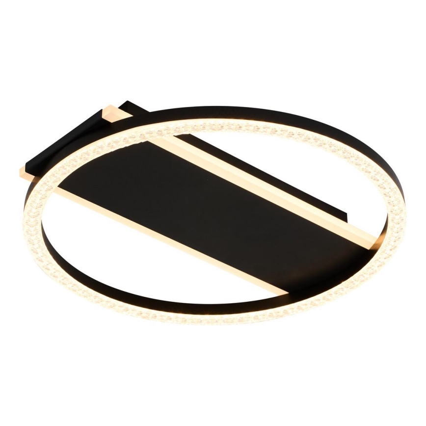 Stropné svietidlo s kruhovým tvarom a LED osvetlením je pripevnené k stropu. Stred svietidla tvorí čierny obdĺžnikový panel s tenkým zlatým rámom, ktorý je obklopený kruhovým lemom s malými LED diódami.