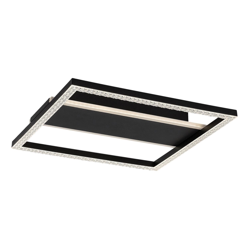 Štvorcové stropné svietidlo s čiernym rámom osadeným kryštálikmi svieti. Vnútorná časť je tmavá. Svietidlo je zavesené na bielom pozadí.