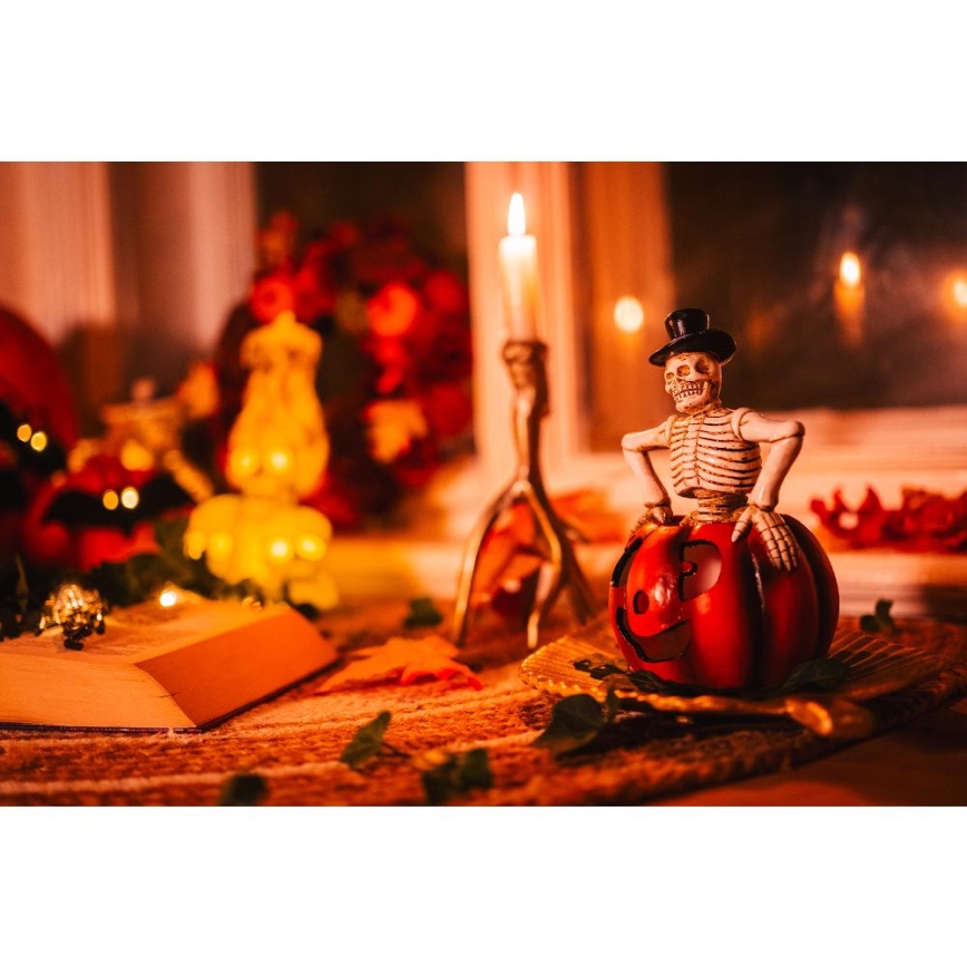 LED Dekorácia HALLOWEEN LED/2xLR44/teplá biela kostlivec v tekvici živica