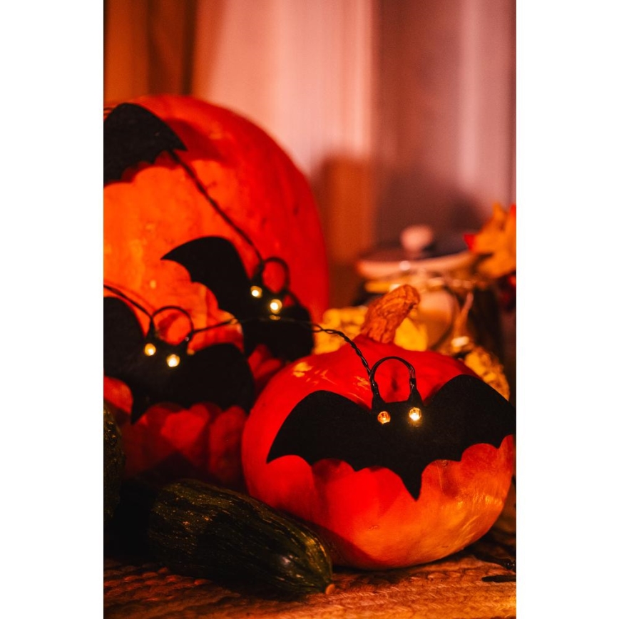 LED Dekoračná reťaz HALLOWEEN 10xLED/2xAA/teplá biela 1,3m netopiere