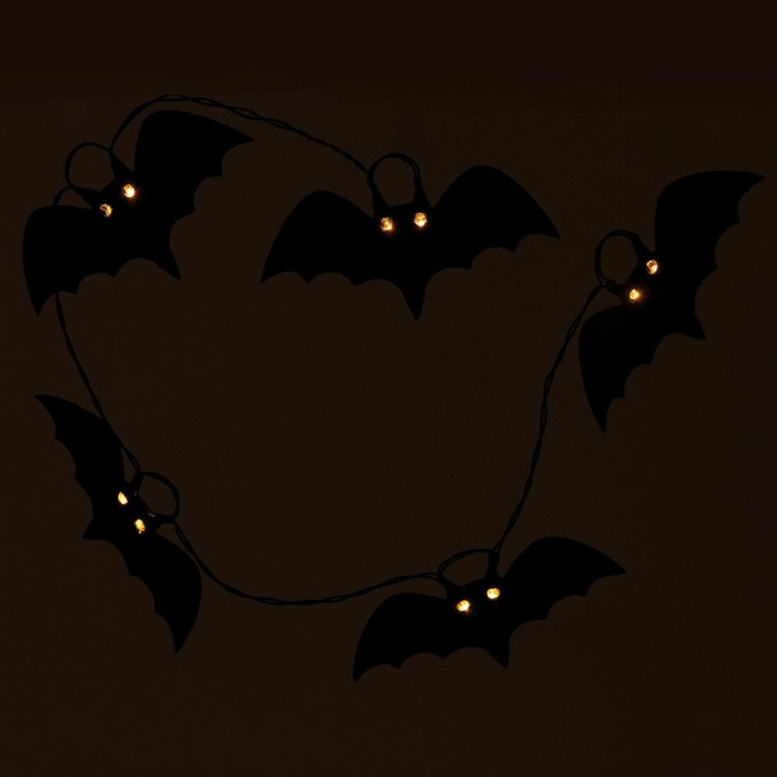 LED Dekoračná reťaz HALLOWEEN 10xLED/2xAA/teplá biela 1,3m netopiere