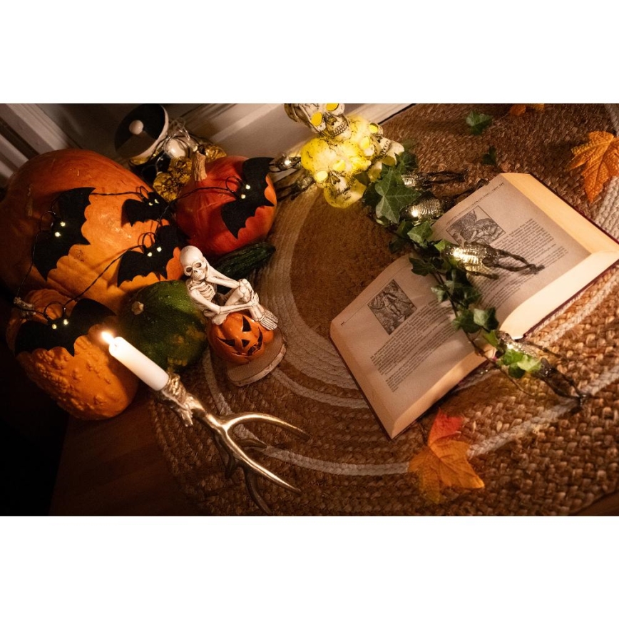 LED Dekoračná reťaz HALLOWEEN 10xLED/2xAA/teplá biela 1,3m netopiere