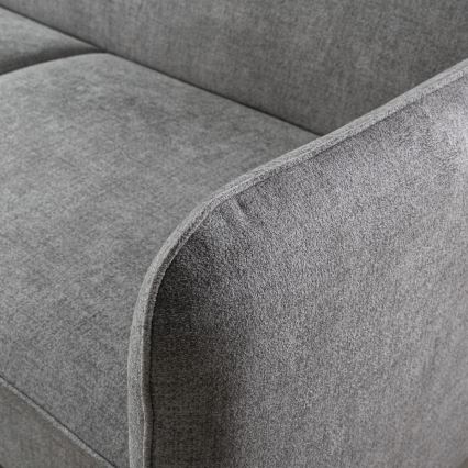 Rozkladacia rohová sedacia súprava do L s úložným priestorom NISA sivá pravá