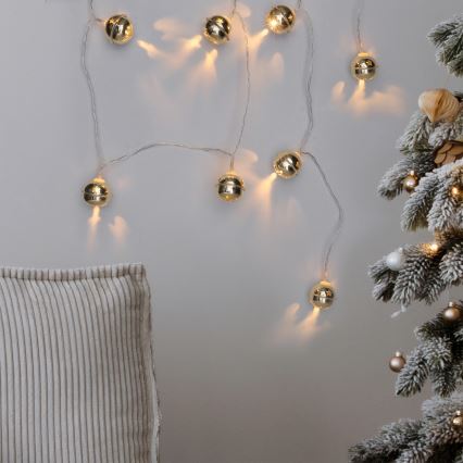 LED reťaz 10× LED / 2× AA / teplá biela / 1,8 m / s rolničkami