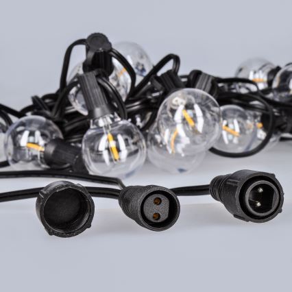 LED vonkajšia dekoratívna svetelná reťaz GIRLANDA 25xE12 20m IP44 teplá biela