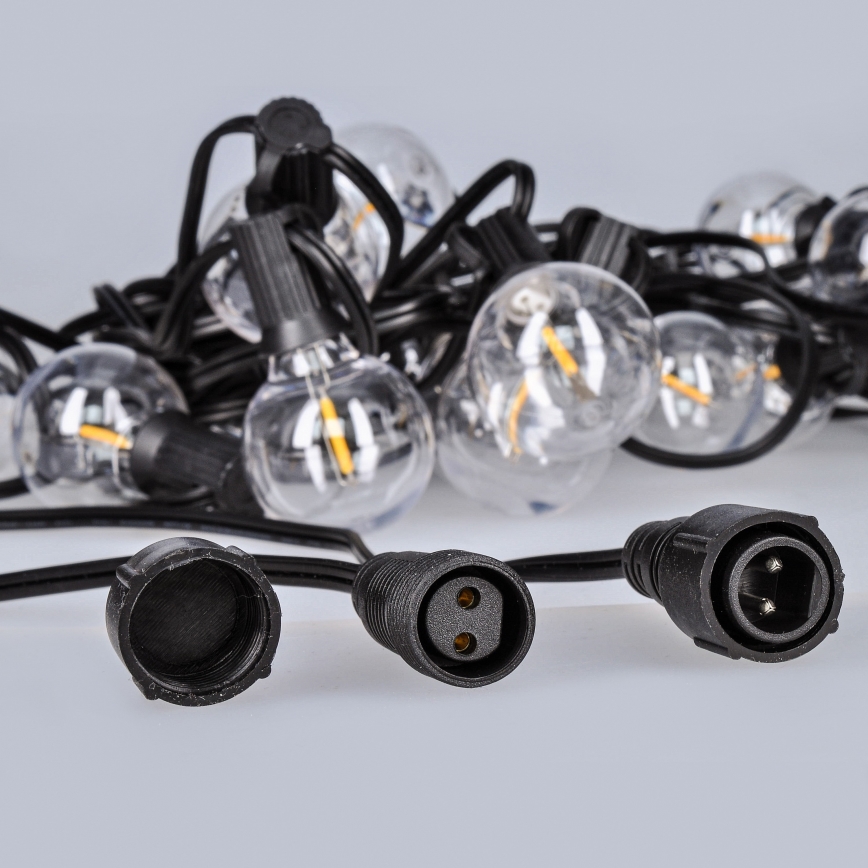 LED vonkajšia dekoratívna svetelná reťaz GIRLANDA 25xE12 20m IP44 teplá biela